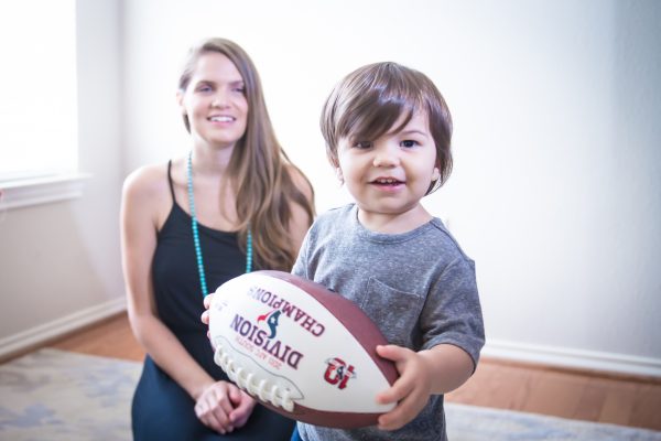 toddler during speech therapy with ball